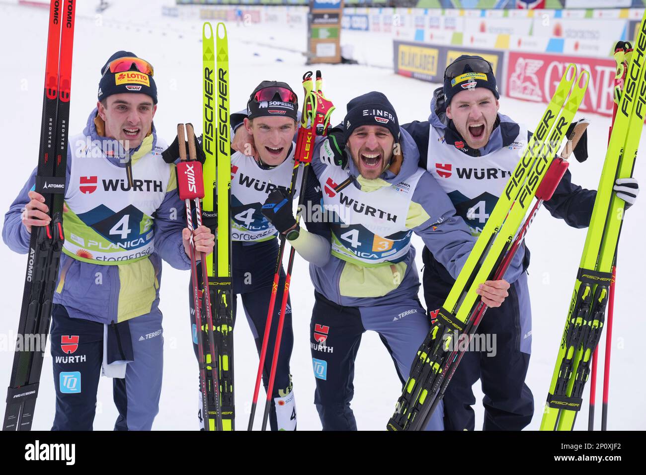 Members of team Germany celebrate their third place in the Cross