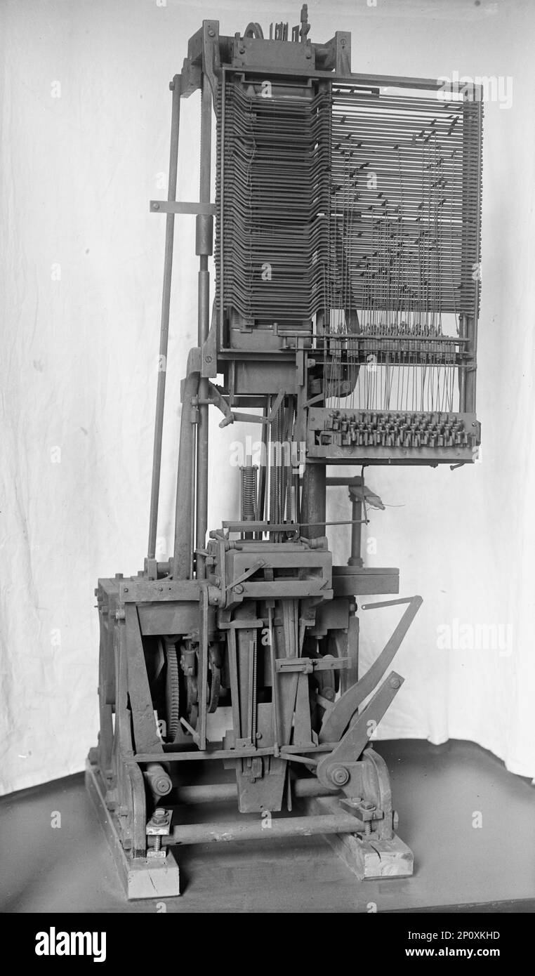 2nd Linotype Machine with Band, invented By Ottmar Mergenthaler; 3rd design he invented at Smithsonian, 1917. The linotype machine was the first device that could easily and quickly set complete lines of type for use in printing presses. Its invention revolutionized the art of printing; the first commercially used Linotype was installed in the printing office of the 'New York Tribune' newspaper in 1886. Stock Photo