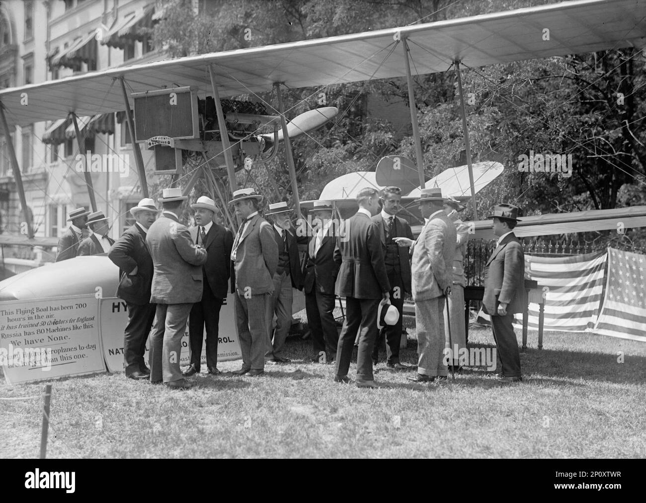 National Aero Coast Patrol Commn. - Curtiss Hydroaeroplane or Flying Boat Exhibited Near House Office Building, Rep. Kahn; Unidentified; Asst. Sec. Ingraham; Adm. [Robert] Peary; Rep. Lieb; Prof. Frankenfield; Bowman; Taylor; Newton; Smith. Unidentified Man, Back Turned Right of Kahn, 1917. Stock Photo