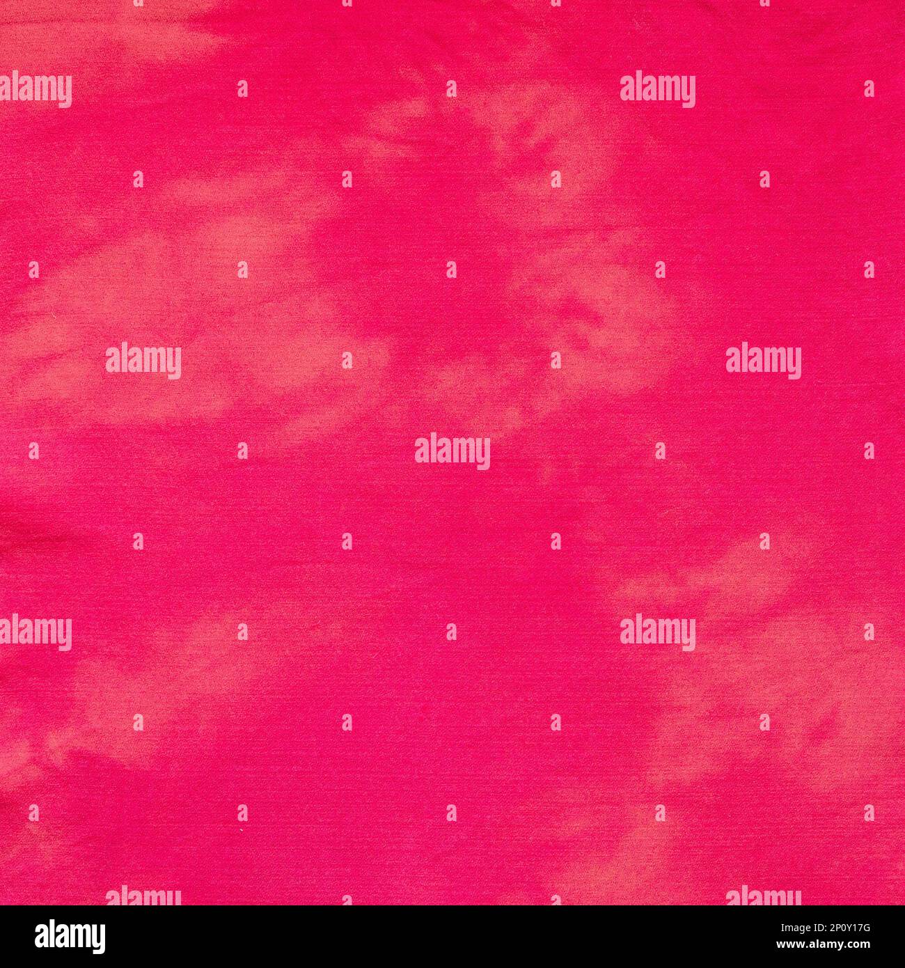 tie-dye red colored square deatail for pathcwork cloth close up Stock Photo