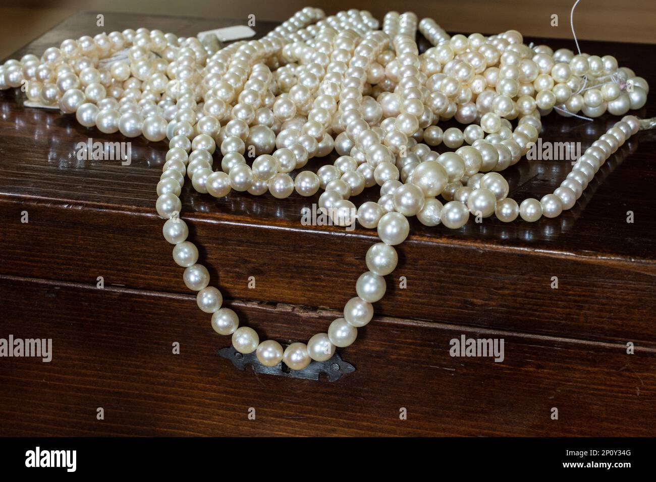 pearl necklaces placed on a box Stock Photo