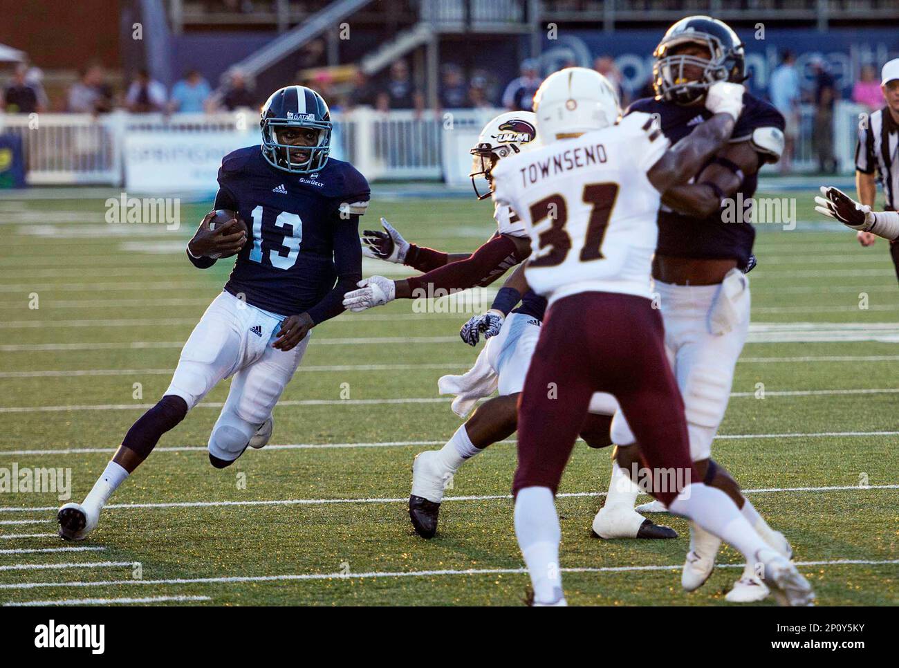 Georgia Southern quarterback Favian Upshaw, left, runs the ball during ...
