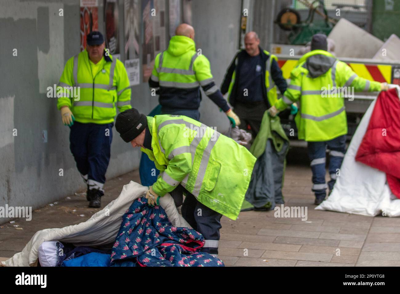 Preston Lancashire. 3 Mar 2023.  UK Weather. Council workmen and street cleaners clear away a  rough sleepers camp established outside a former BHS store, in the city centre.  With a cold spell forecast instructions were given to remove & clean up trash, cardboard, mattresses, bedding, camps and rough shelters from the main high street.  Credit MediaWorldImages/AlamyLiveNews Stock Photo