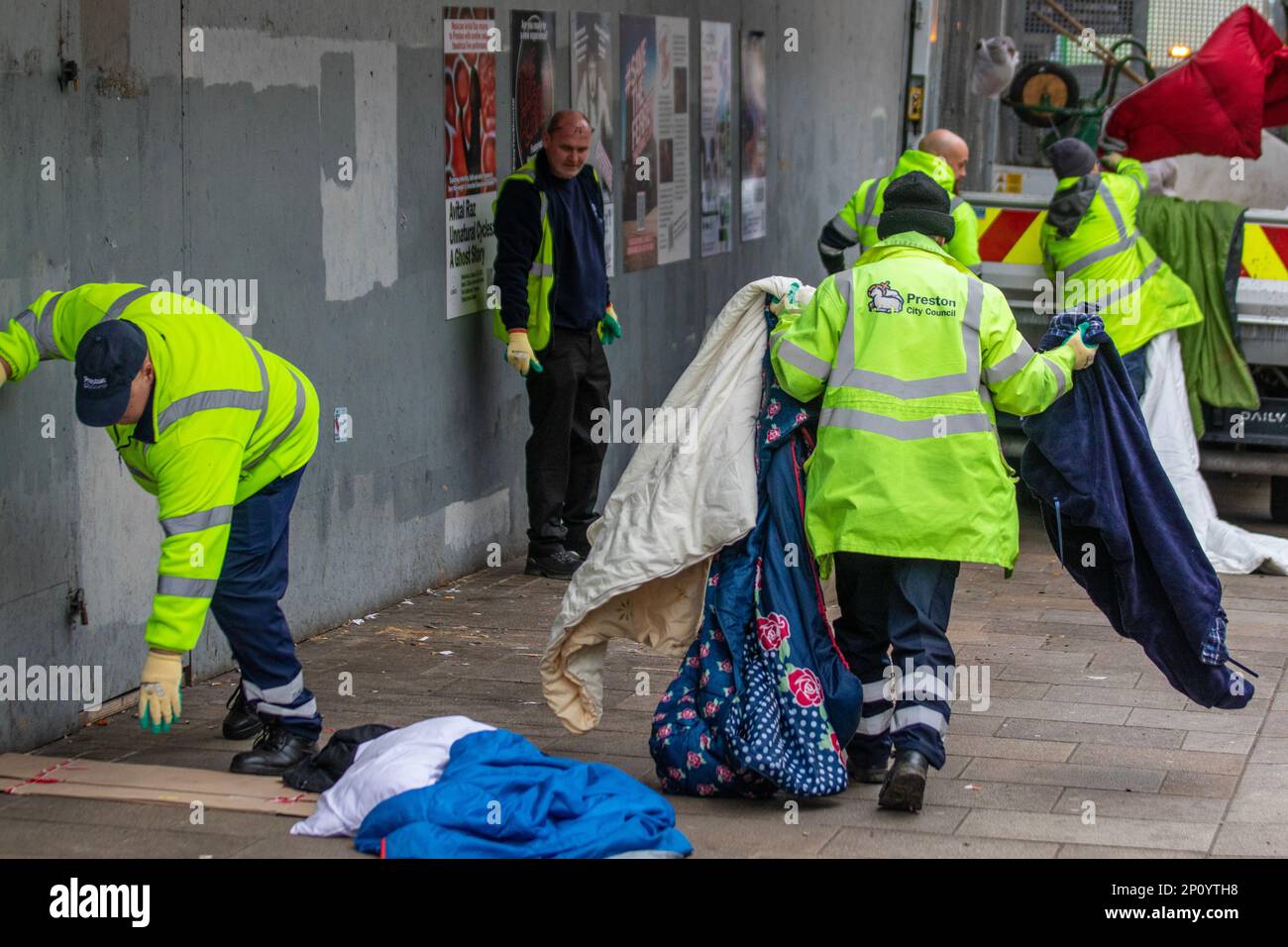 Preston Lancashire. 3 Mar 2023.  UK Weather. Council workmen and street cleaners clear away a  rough sleepers camp established outside a former BHS store, in the city centre.  With a cold spell forecast instructions were given to remove & clean up trash, cardboard, mattresses, bedding, camps and rough shelters from the main high street.  Credit MediaWorldImages/AlamyLiveNews Stock Photo