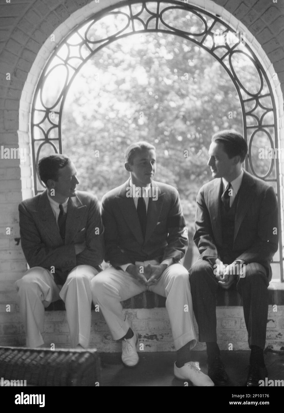 Brady, Mosely, and Scott group, seated in a window, 1930 May 24. Stock Photo