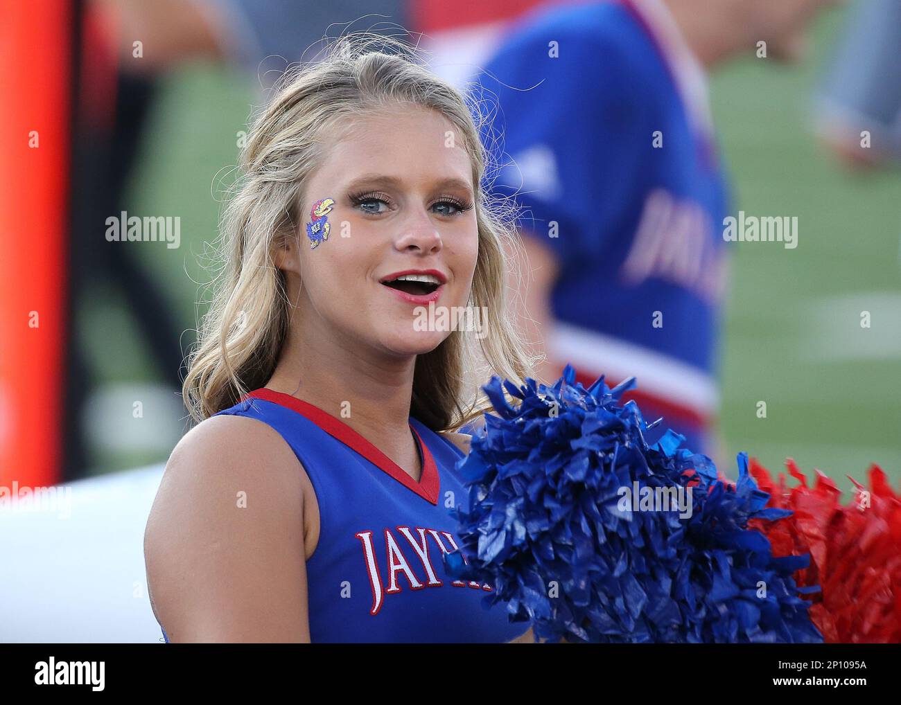 3 Sep 2016: A KU cheerleader performs during the NCAA football season ...
