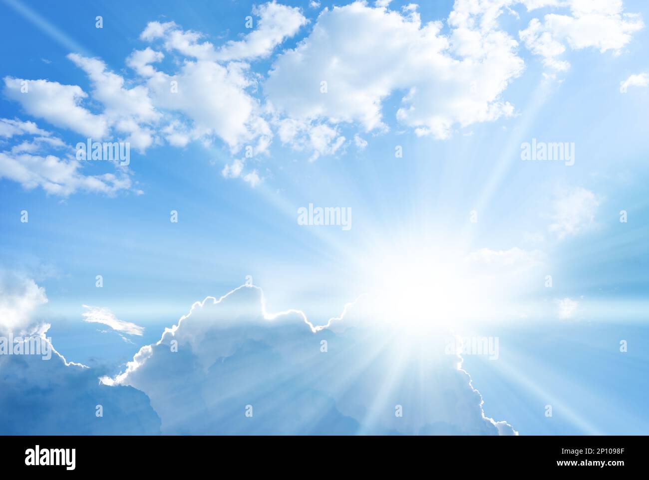 Blue sky background with clouds and sun rays coming out Stock Photo - Alamy