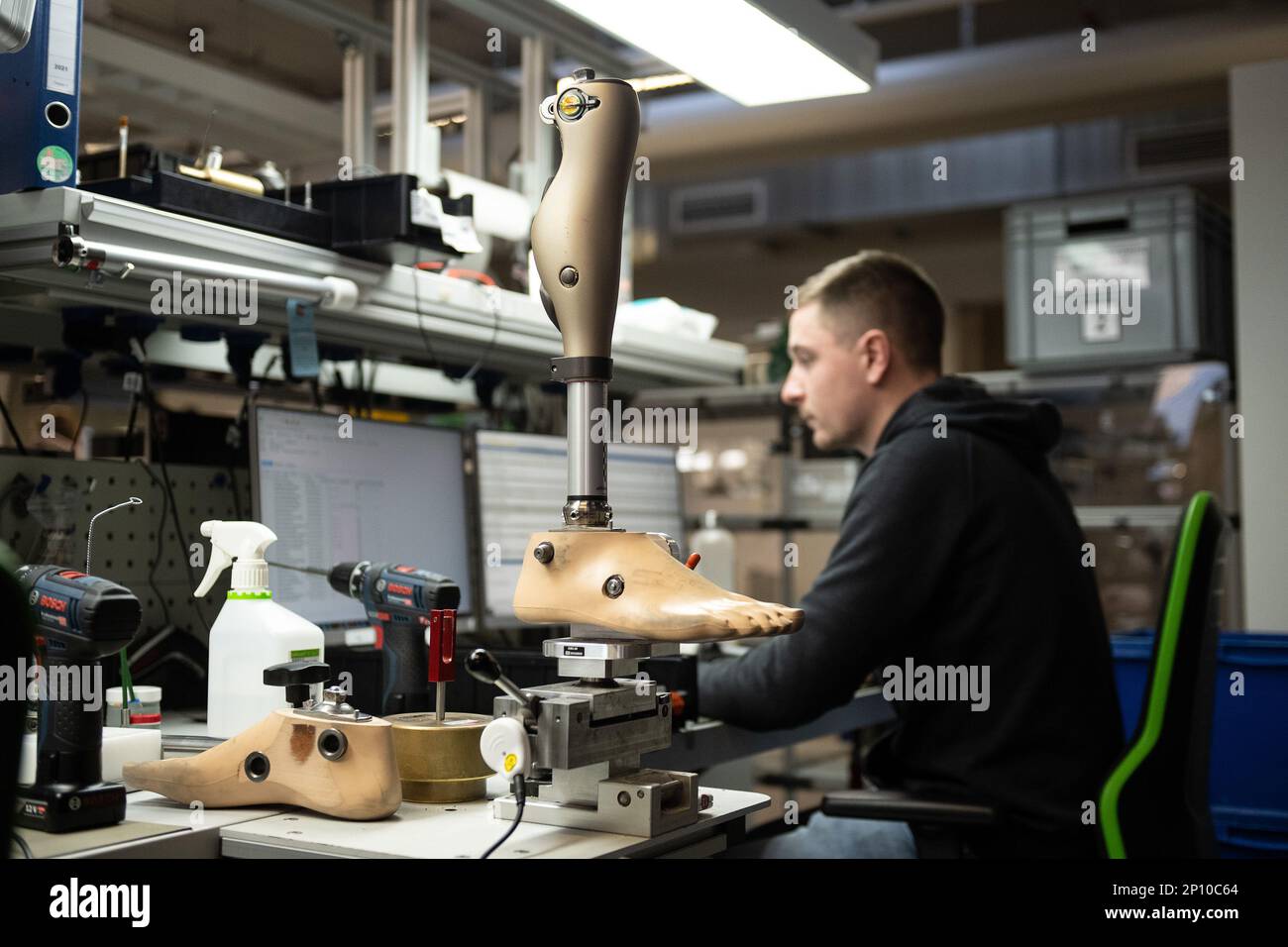 Duderstadt, Germany. 02nd Mar, 2023. An employee checks a prosthesis at