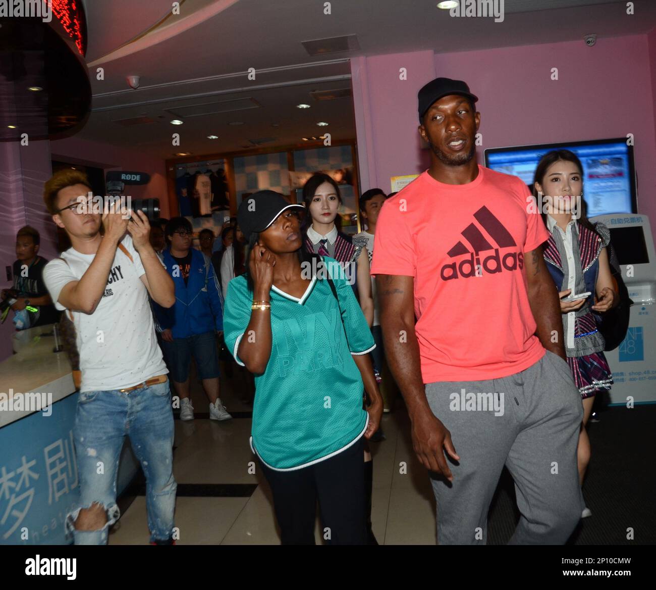 Retired NBA star Chauncey Billups, right, and his wife are pictured at