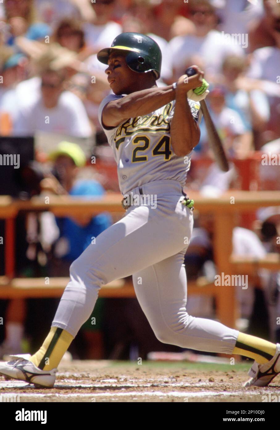 Oakland A's Rickey Henderson (24) during a game from his career with the  Oakland A's. Rickey Henderson played for 25 years with 9 different teams  and was inducted to the Baseball Hall