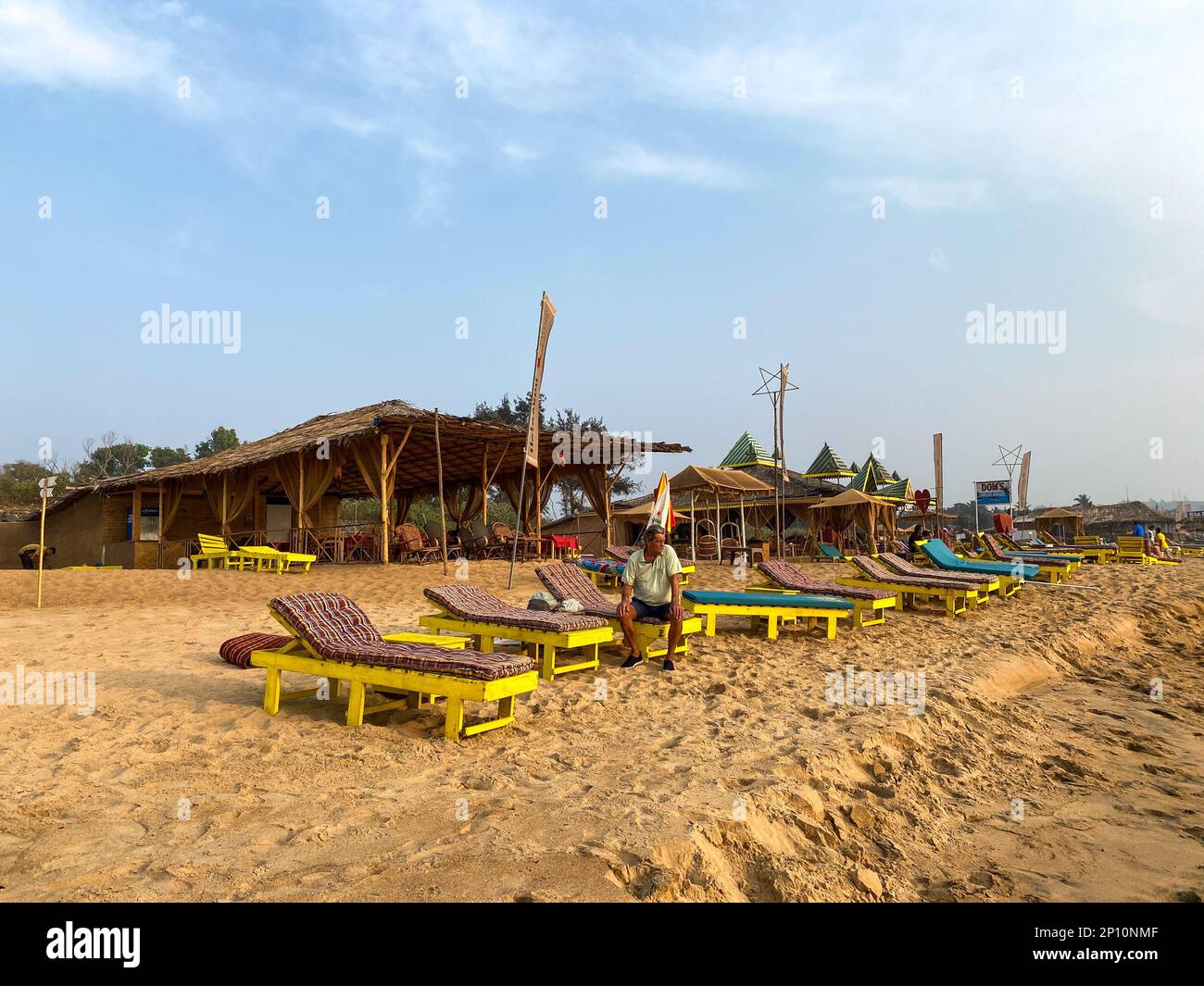 Candolim, Goa, India January 2023 Colorful sun beds outside a
