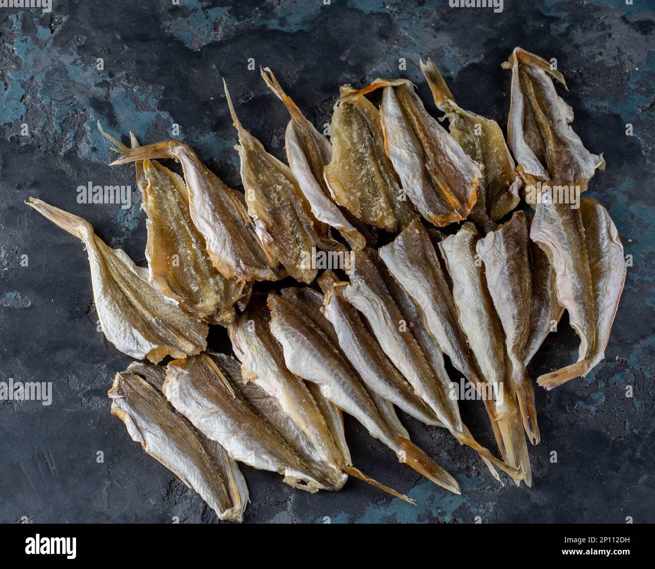 Salted dried horse mackerel, yellow minke fish. Fish appetizer for beer. Stockfish Stock Photo