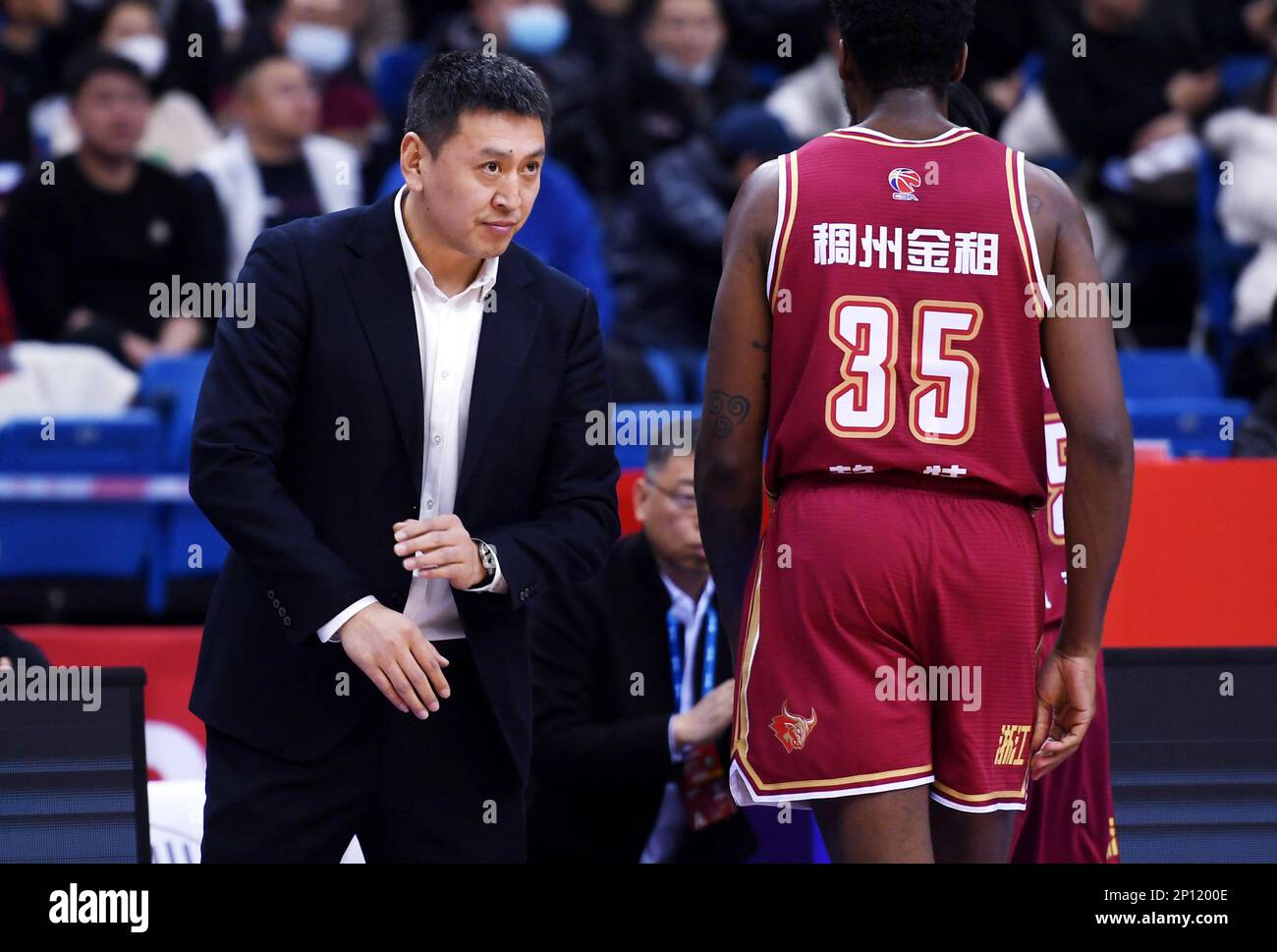 qingdao-chinas-shandong-province-3rd-mar-2023-wang-shilong-l-head-coach-of-zhejiang-golden-bulls-communicates-with-moses-wright-during-the-30th-round-match-between-qingdao-eagles-and-zhejiang-golden-bulls-at-the-2022-2023-season-of-the-chinese-basketball-association-cba-league-in-qingdao-east-chinas-shandong-province-march-3-2023-credit-li-zihengxinhuaalamy-live-news-2P1200E.jpg