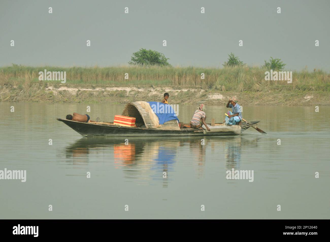 Rural side boat on the river scene in Bangladesh. Stock Photo