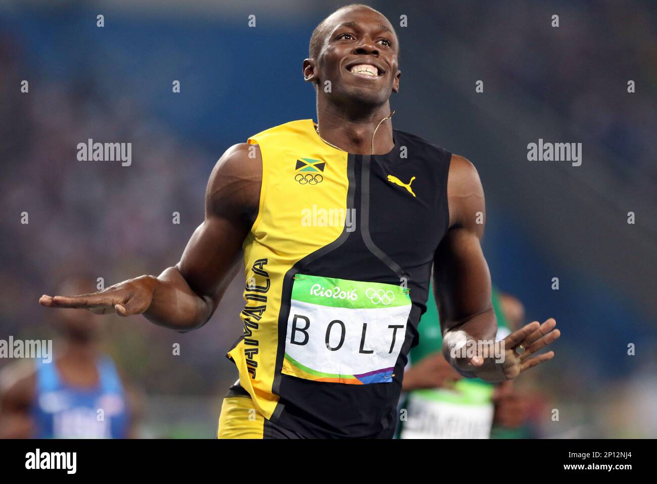 Usain Bolt Runs The 100 Meter Race During The Men's Final At Olympic ...