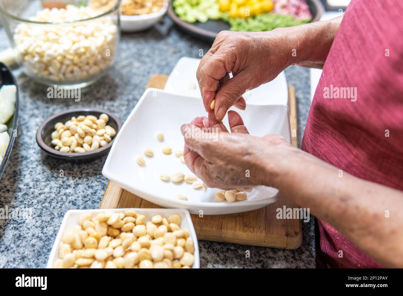Hands elderly woman peel hi-res stock photography and images - Alamy