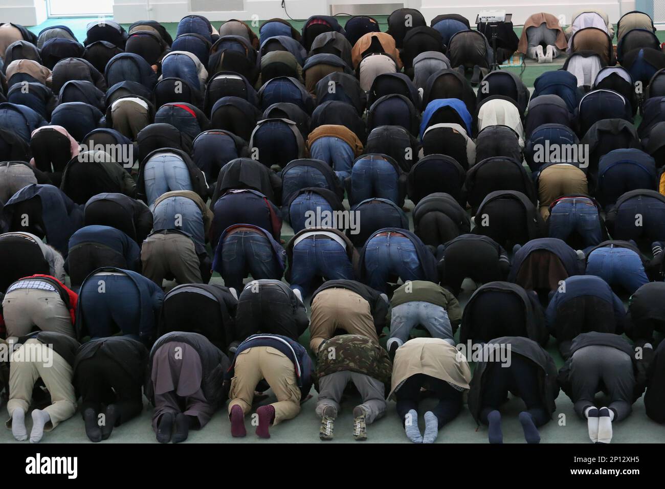 London, UK, 3rd March, 2023. Friday prayers at the Baitul Futuh Mosque. Britain's biggest mosque and one of the largest mosque complexes in Europe officially re-opens this weekend after a fire in 2015 destroyed large parts of the site. The 20 million pound redevelopment project was funded by the Ahmadiyya Muslim Community. Credit: Katie Collins/Alamy Live News Stock Photo