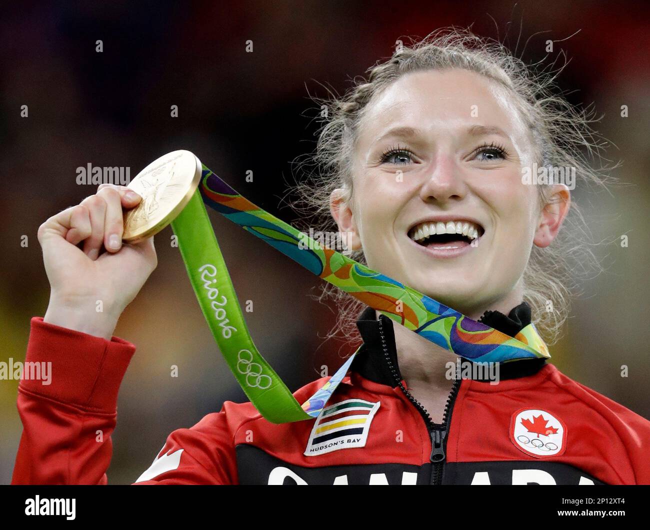 Canada's Rosannagh MacLennan displays her gold medal during the women's