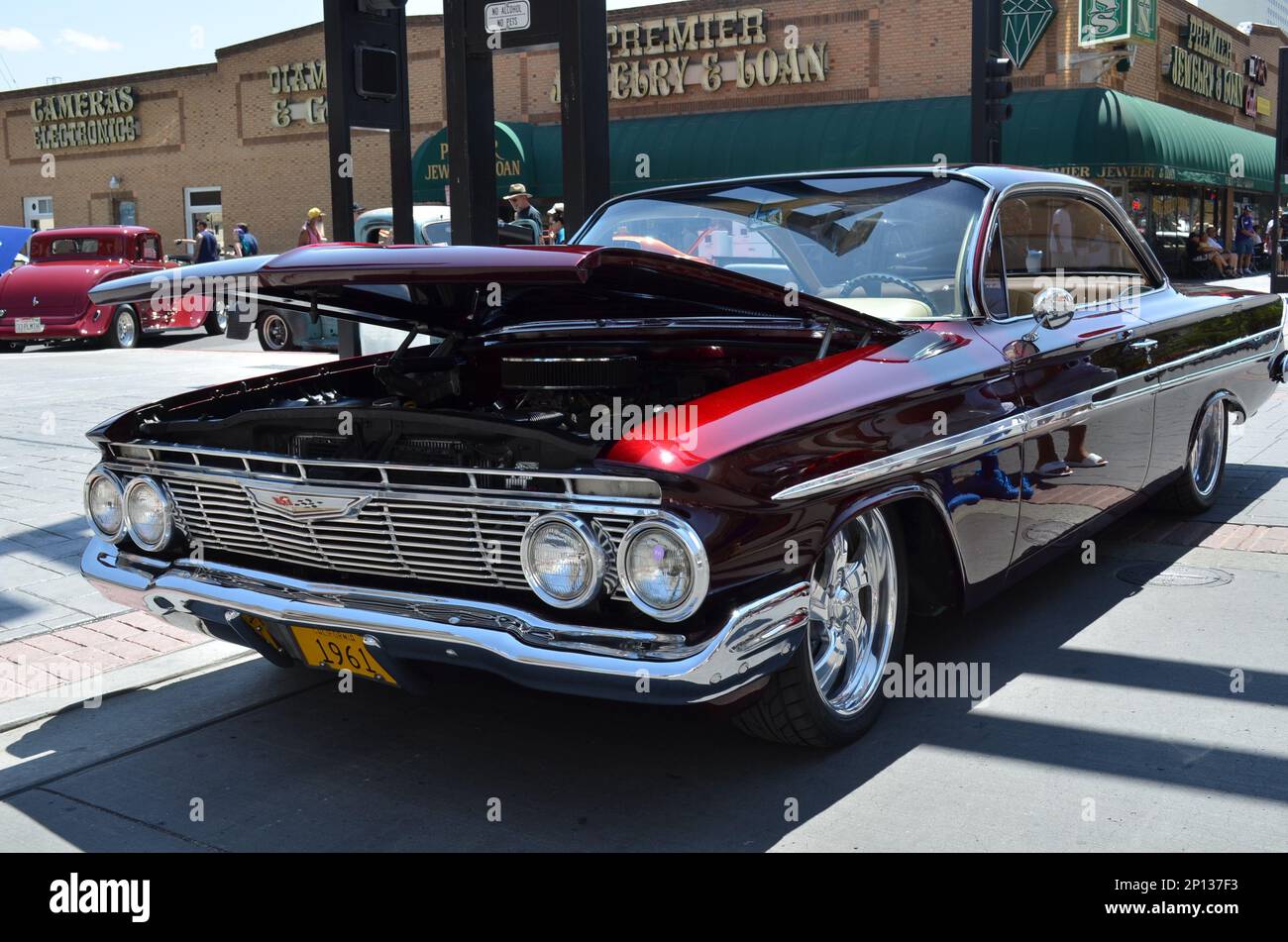 August 05 2016: Beautiful 1961 Chevy Impala with Candy Brandywine paint  scheme at the 30th Anniversary of the Hot August Nights Custom Car Show the  largest nostalgic car show in the world