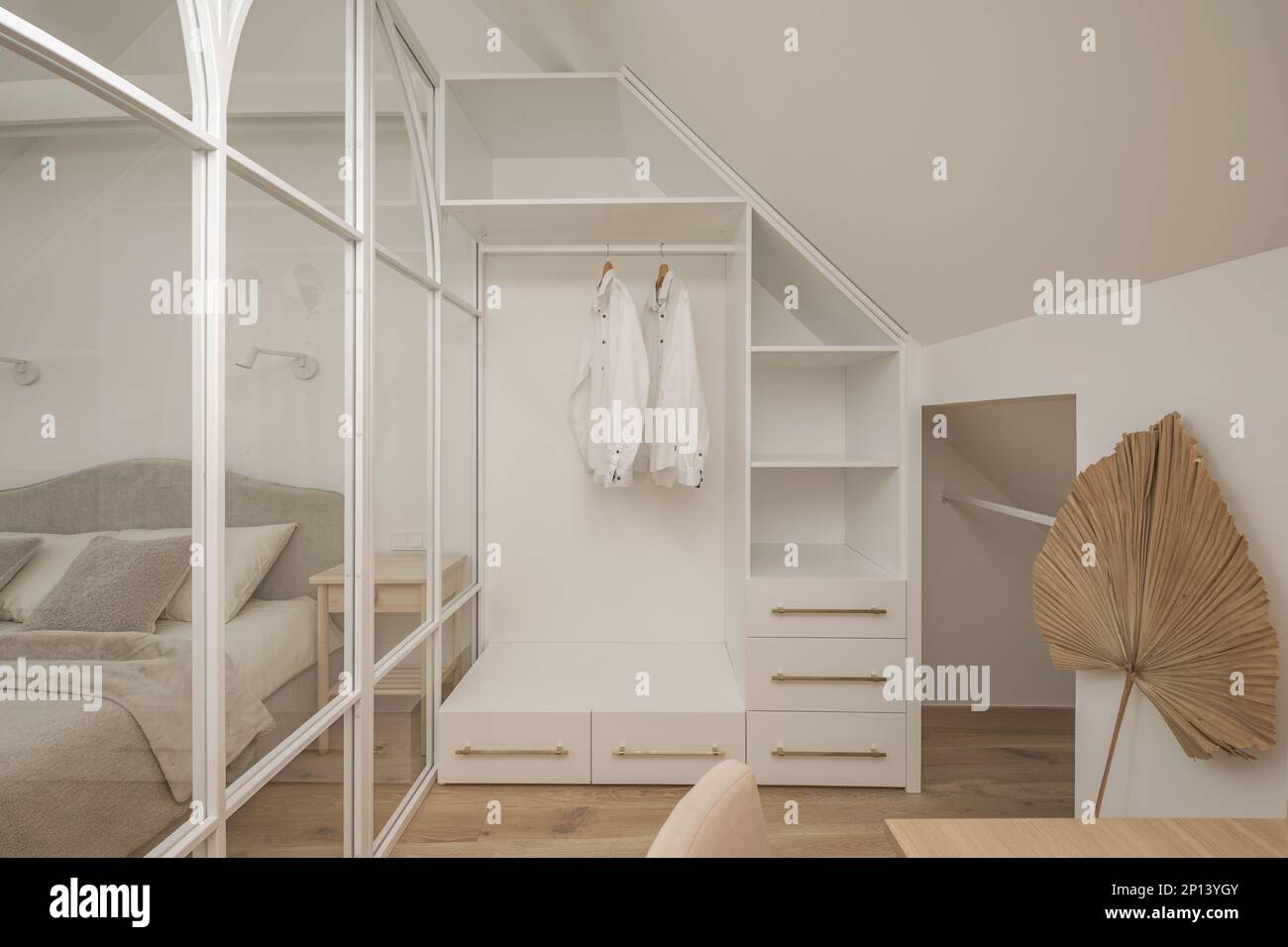 A cozy Home interior in warm beige tones in Japanese  and Scandinavian Style. Modern Scandinavian wardrobe Interior Design. Japandi Concept Stock Photo