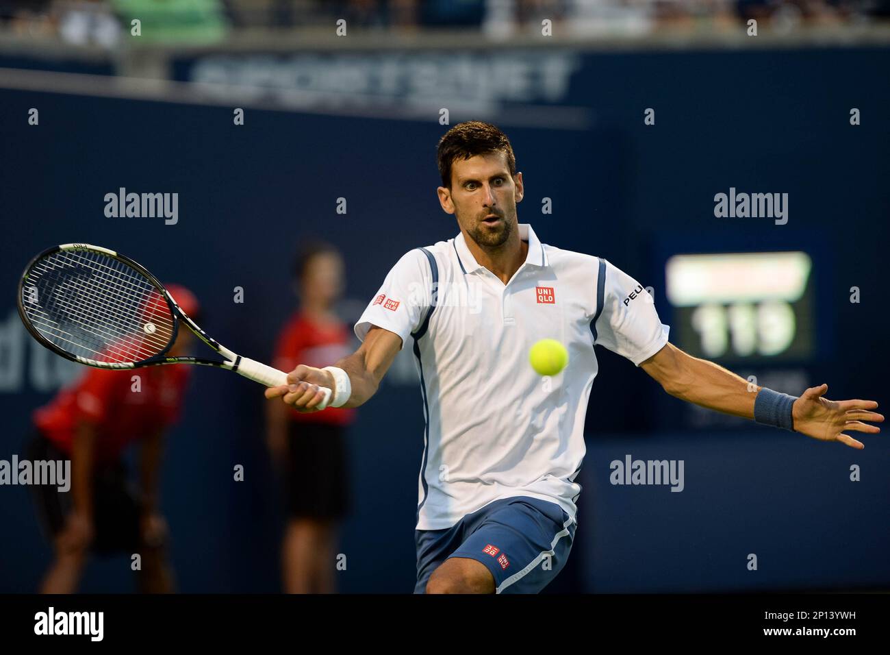 July 30, 2016 Novak Djokovic of Serbia and Montenegro returns the ball to Gael Monfils of France during their semifinal match of the Rogers Cup tournament at the Aviva Centre in Toronto,