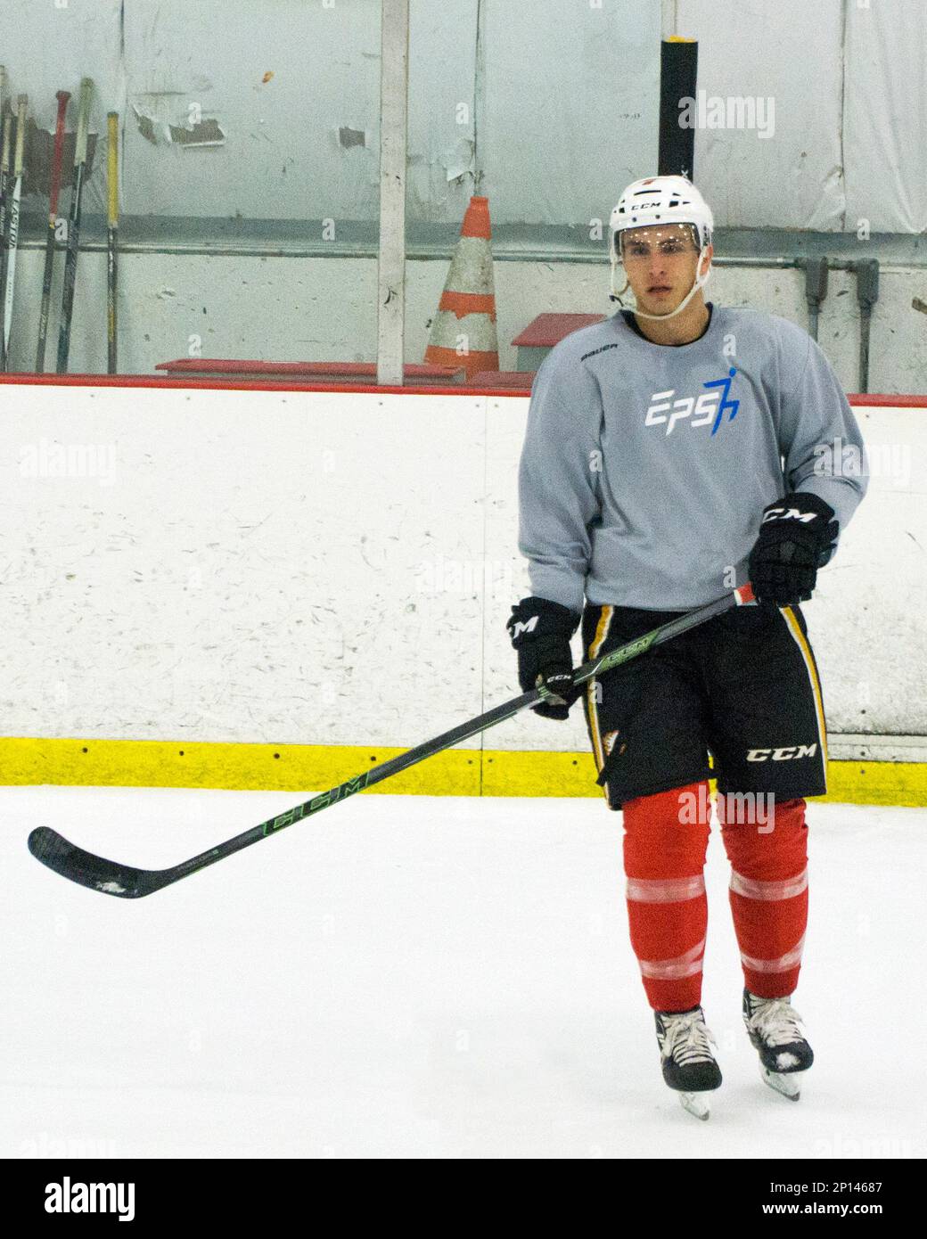 NHL Calgary Flames forward Garrett Hathaway skates up ice during a