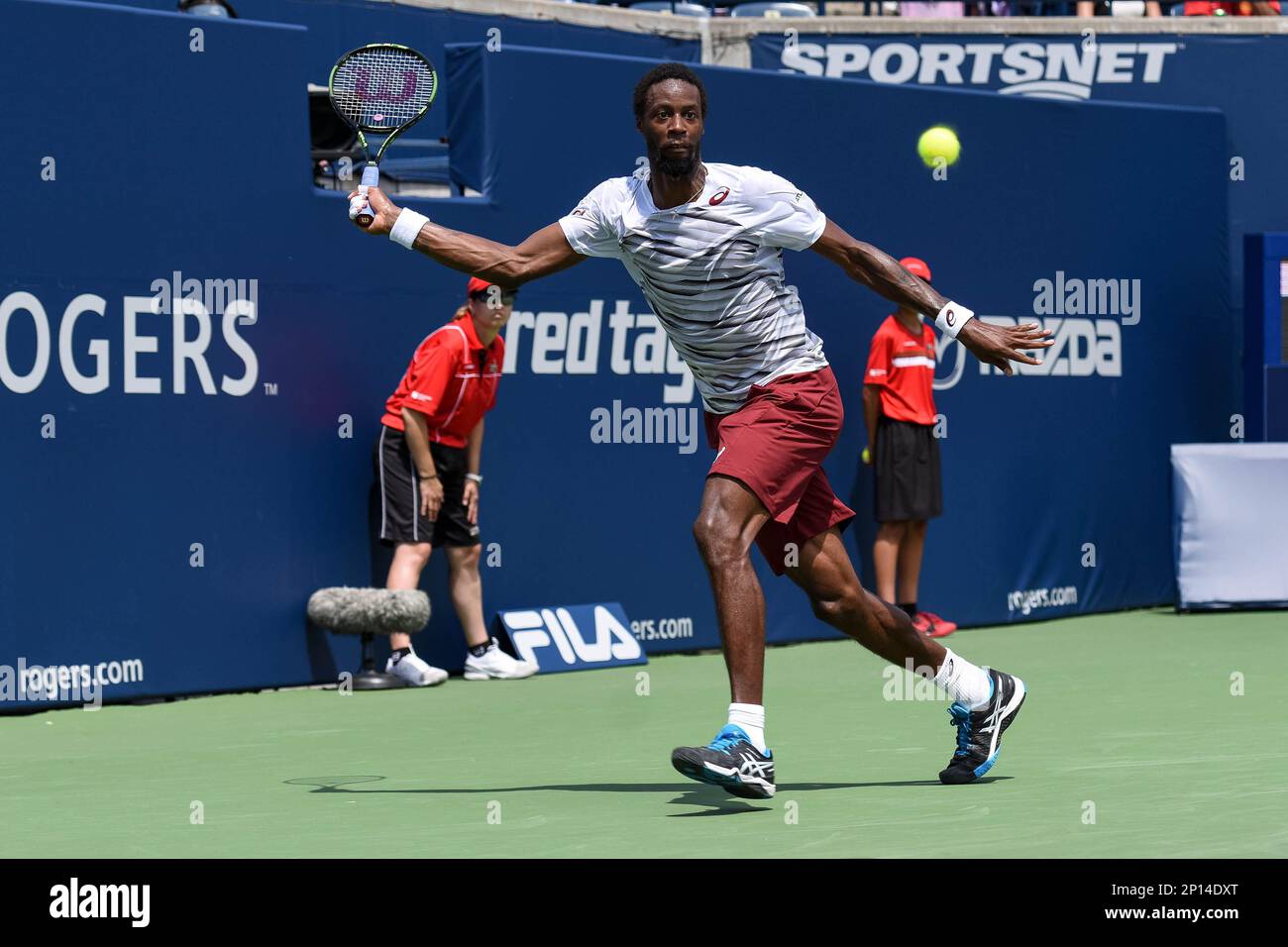 July 26, 2016: Gael Monfils of France returns the ball to Joao Sousa or  Portugal during their first round match of the Rogers Cup tournament at the  Aviva Centre in Toronto, Ontario,
