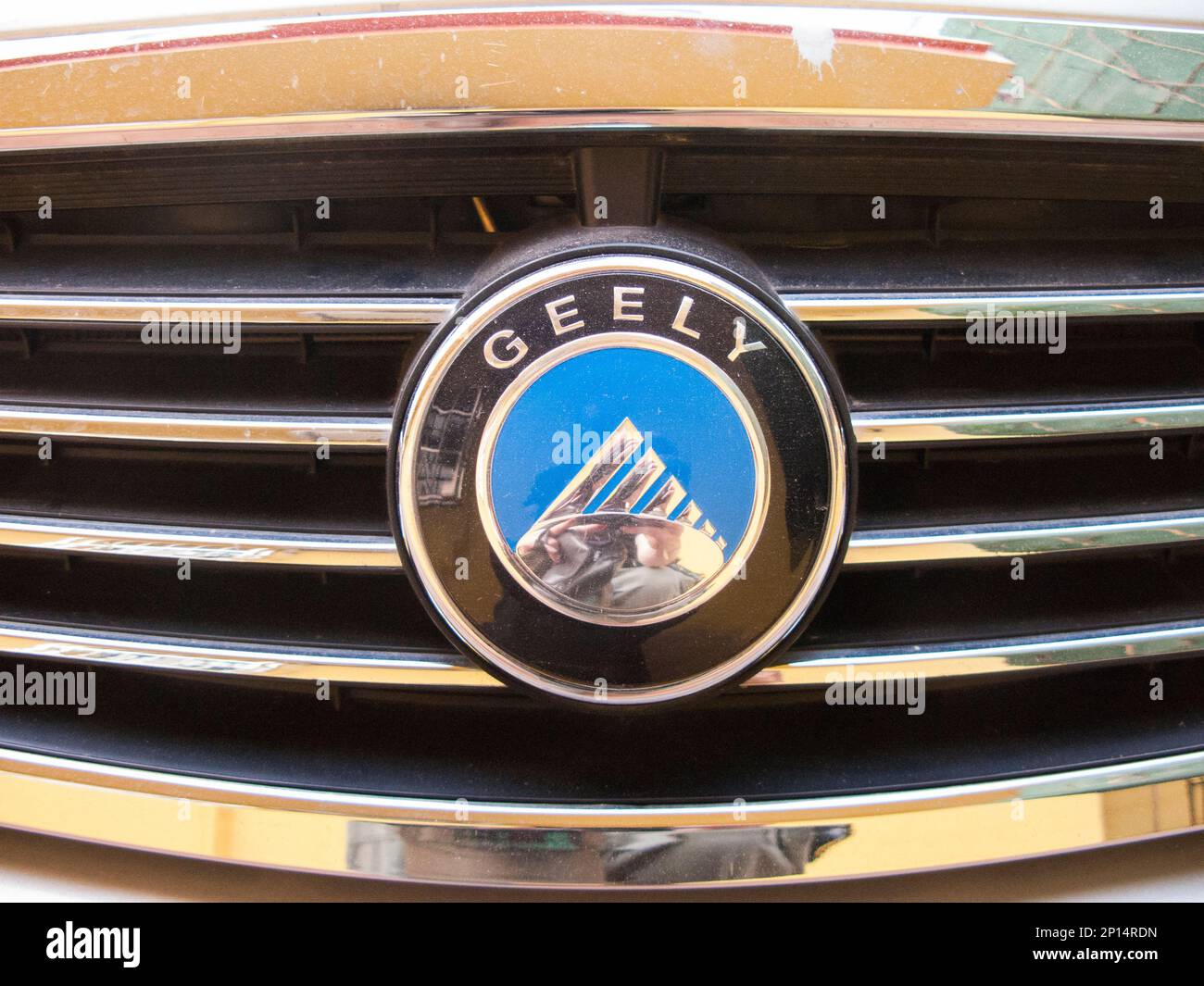 Geely company badge / car maker radiator grille logo on car front grill /  vehicle in China. Xian, PRC. (125 Stock Photo - Alamy