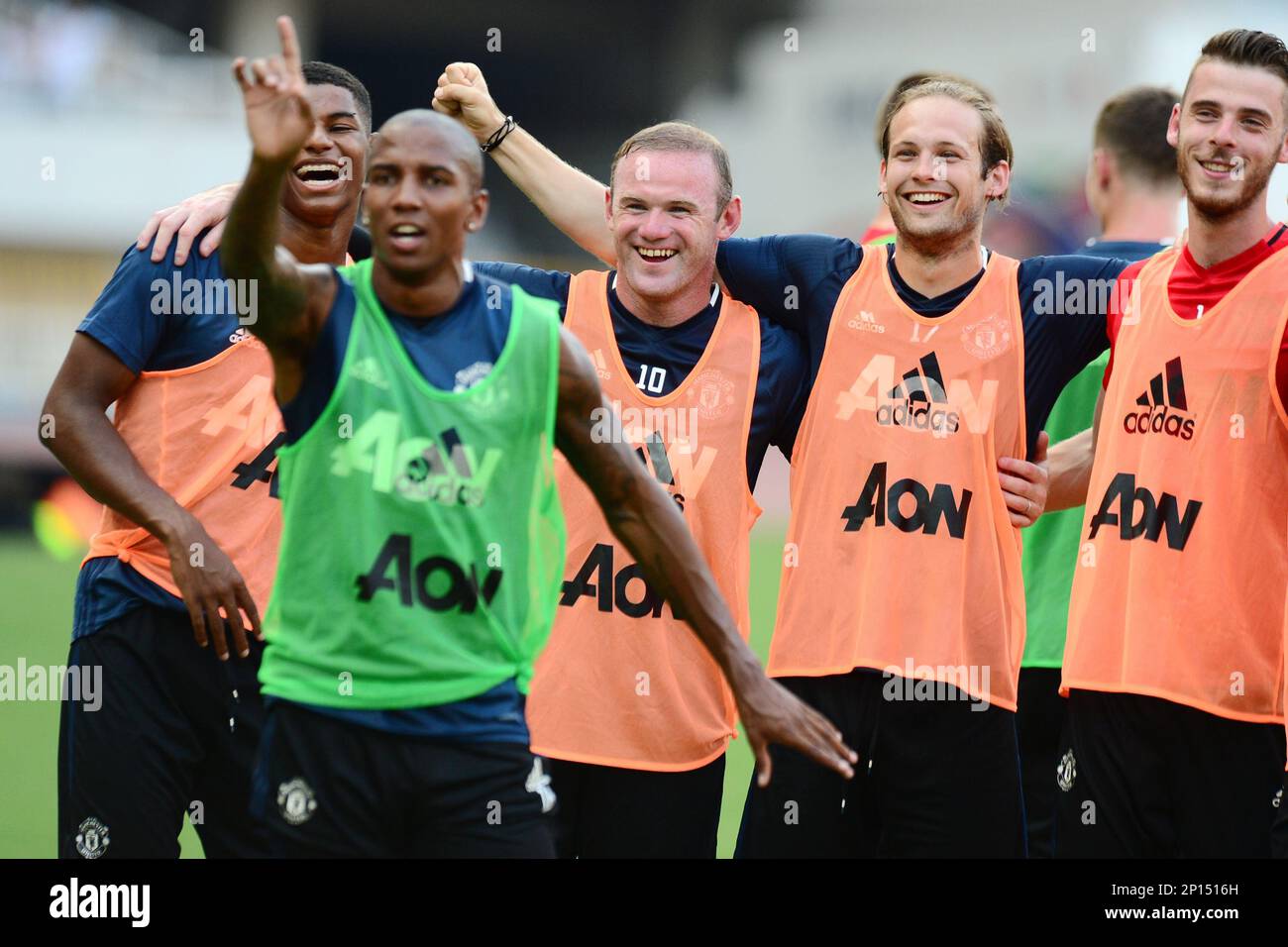 Manchester United's David De Gea (R1), Daley Blind (R2), Wayne Rooney (C)  and Ashley Young (L2) attend a training session preparing for Friday's  International Champions Cup China soccer match against Borussia Dortmund