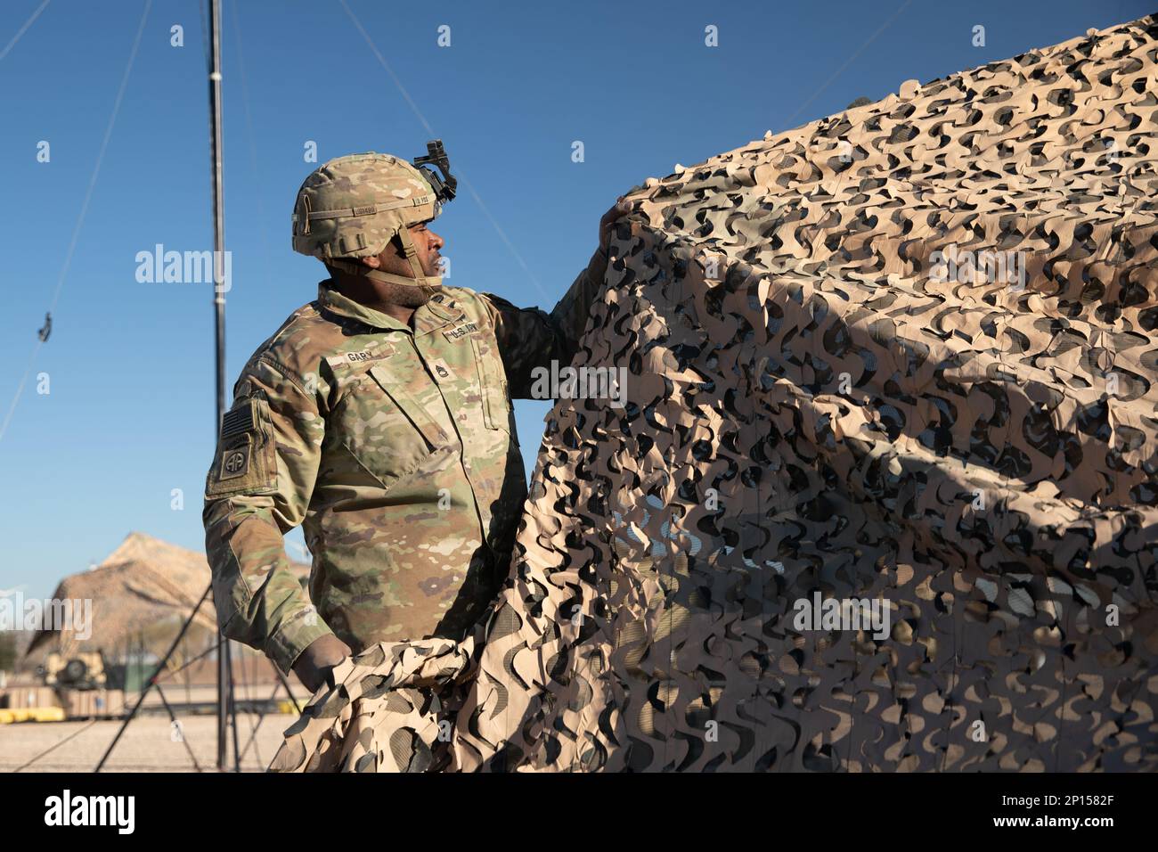 Sailors of the USCG in camouflage blue uniforms undergoing a drill exercise  at the Davis-Monthan AFB airshow day in Tucson AZ Stock Photo - Alamy