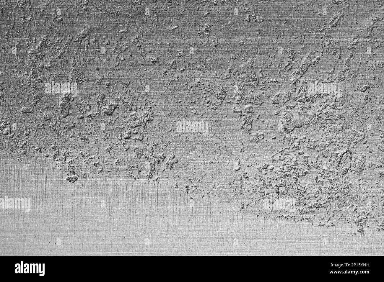 Tempered rough half polished silver metal texture background Stock