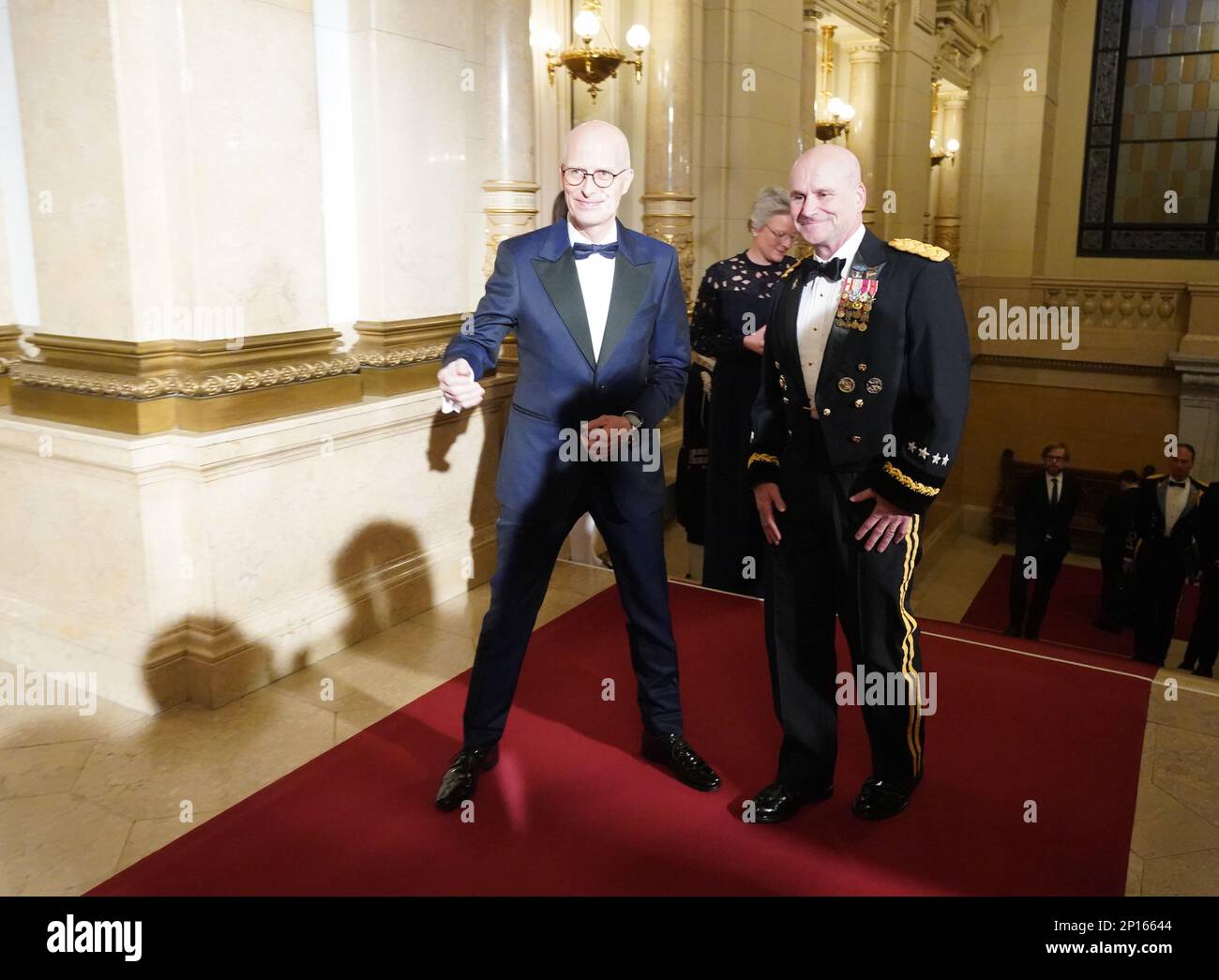 Hamburg, Germany. 03rd Mar, 2023. Peter Tschentscher (l, SPD), First Mayor and President of the Senate of the Free and Hanseatic City of Hamburg, welcomes U.S. General Christopher Cavoli, Commander-in-Chief of the North Atlantic Treaty Organization (NATO), and his wife Christin Cavoli, before the start of the traditional Matthiae meal at City Hall. The Matthiae meal is considered the oldest guest meal still celebrated in the world. Credit: Marcus Brandt/dpa/Alamy Live News Stock Photo