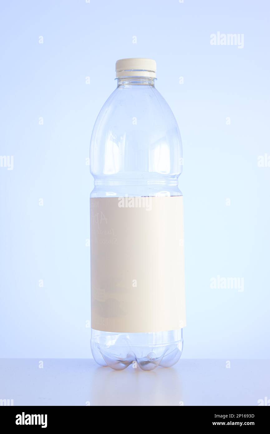 Empty blue drinking water container isolated on white background Stock  Photo - Alamy