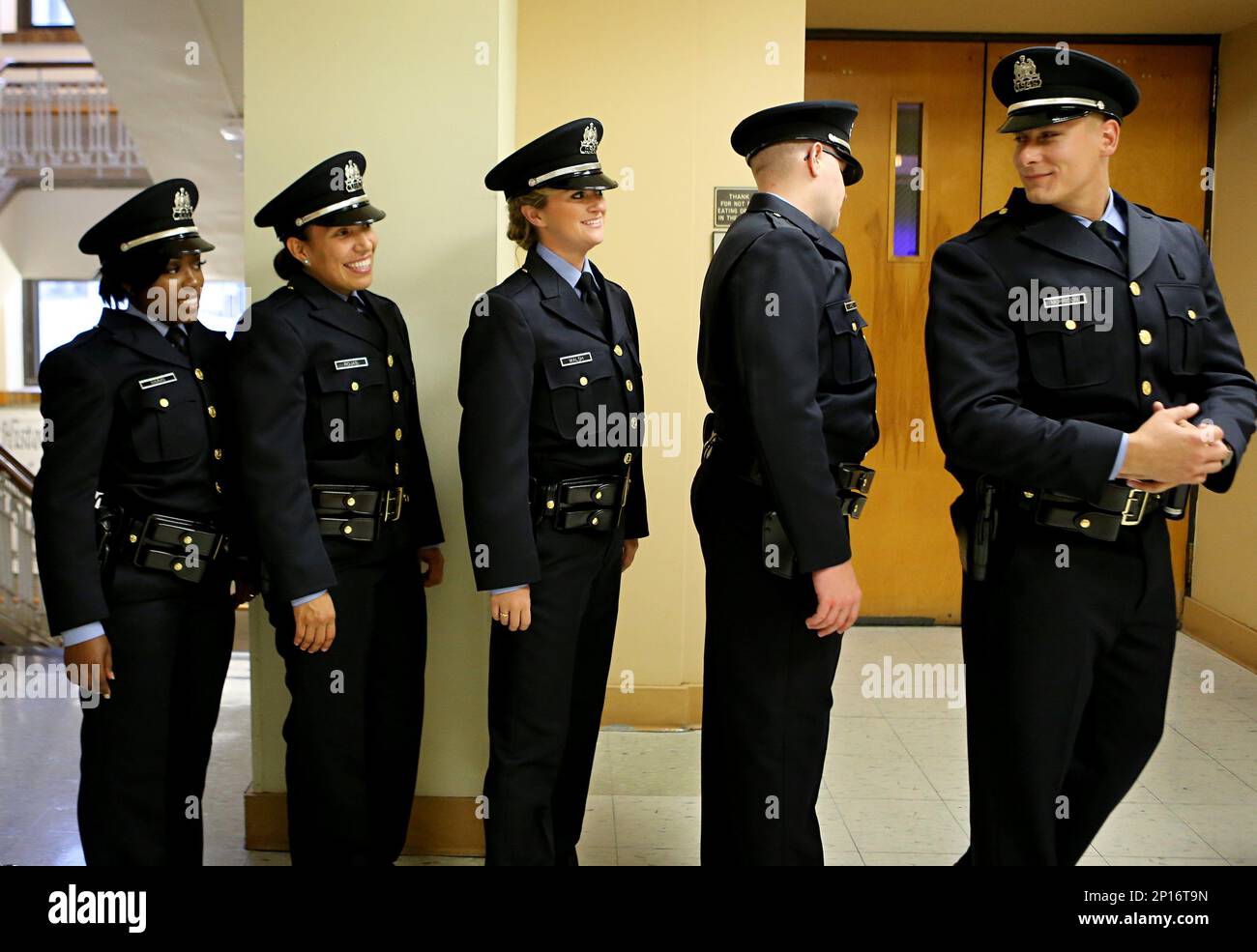 In a Thursday, June 30, 2016 photo, New graduates of the St. Louis
