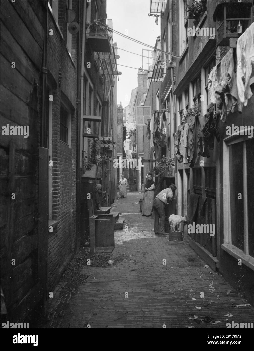 Travel views of Europe, between 1904 and 1938. Back alley with lines of