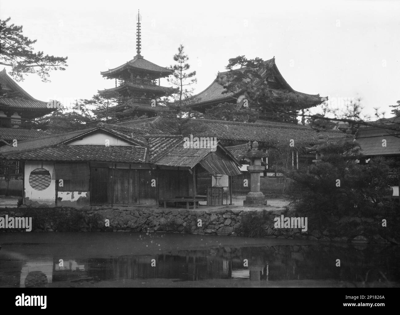Travel views of Japan and Korea, 1908. Photo shows Horyuji, a temple in Ikaruga, Japan. The pagoda, constructed in the 7th century, is considered one of the oldest wooden buildings in the world. Stock Photo