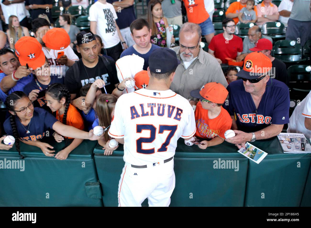 Houston Astros second baseman Jose Altuve (27) signing autograph