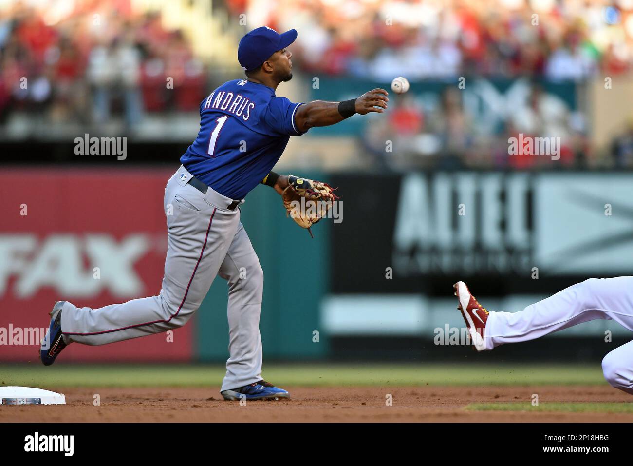 Texas Rangers shortstop Elvis Andrus (1) leaps over Houston Astros