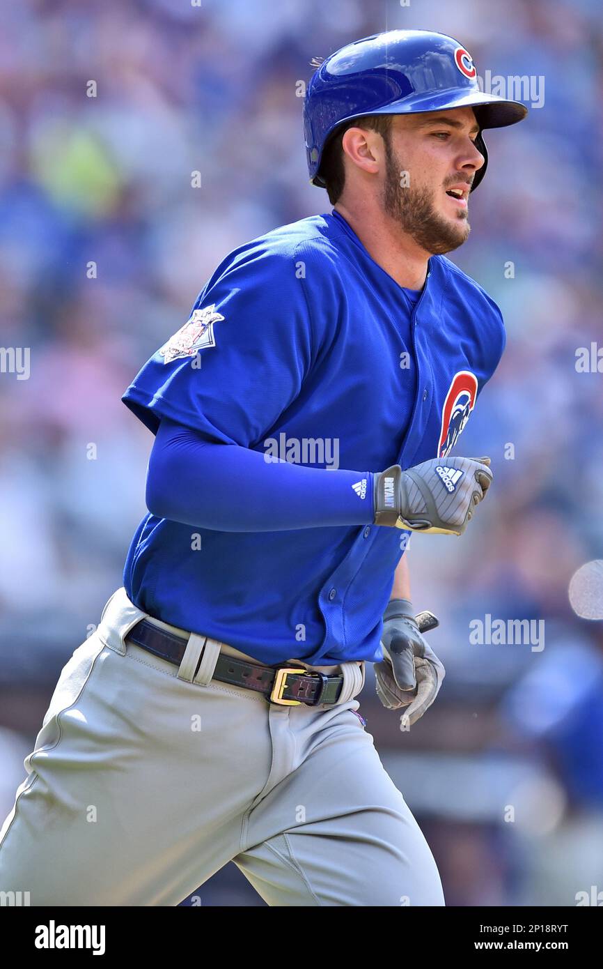 Chicago Cubs third baseman Kris Bryant (17) runs to first during a game