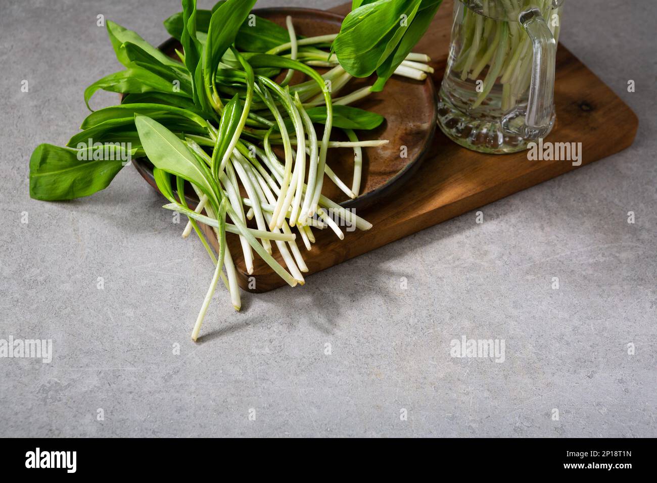 Spring organic food wild ramson leek on plate Stock Photo