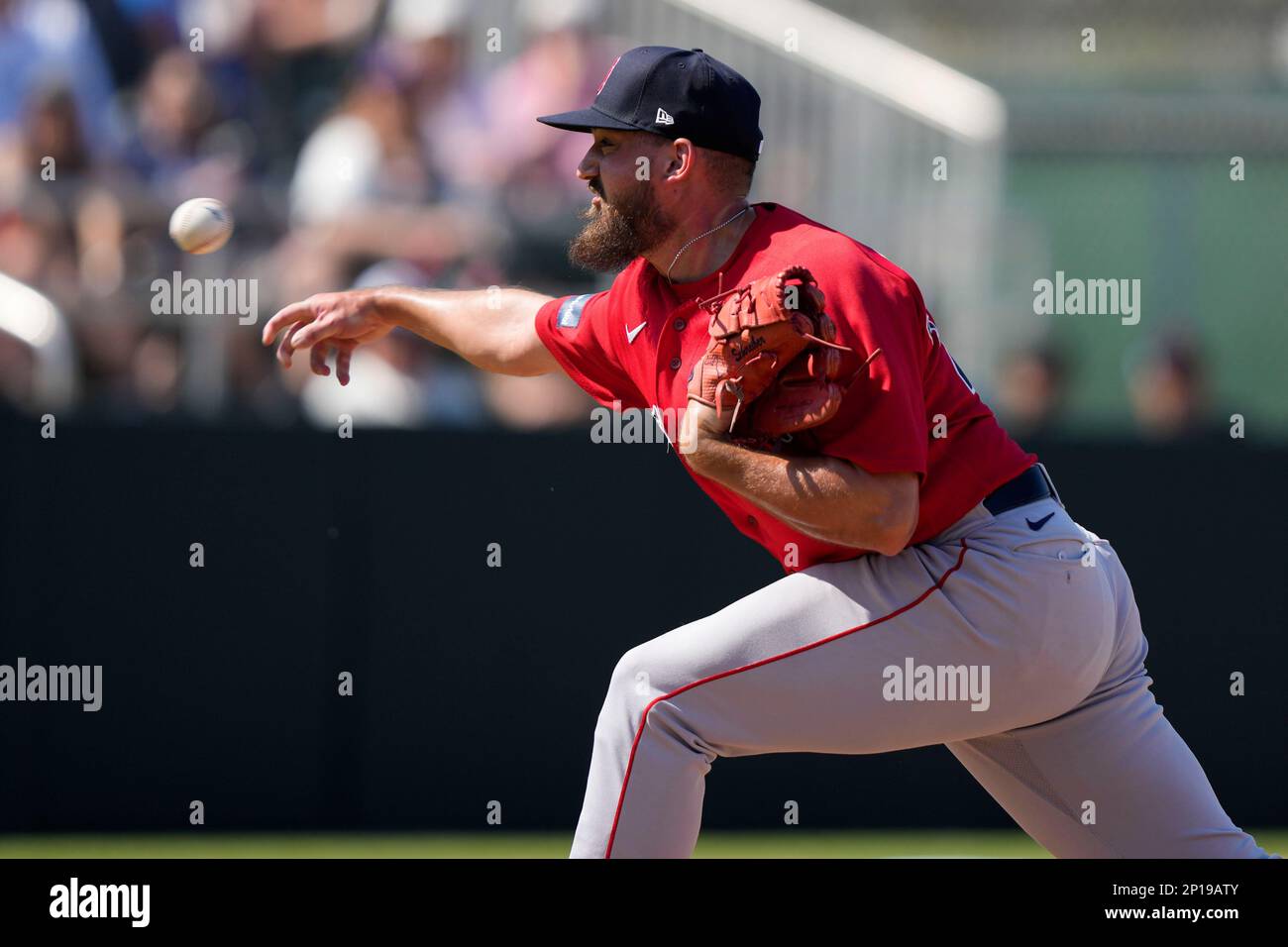Boston Red Sox relief pitcher John Schreiber throws in the third inning