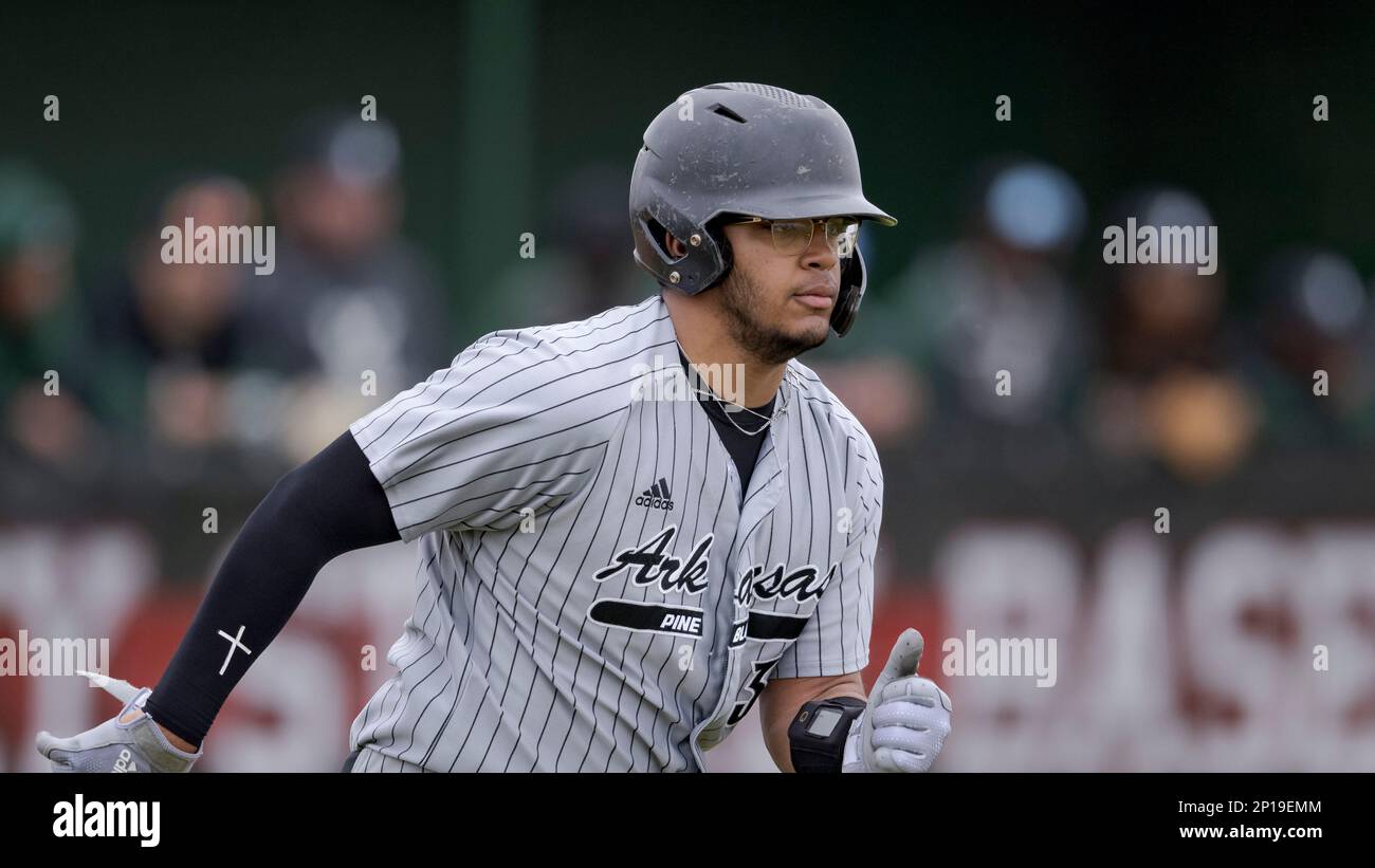 ArkansasPine Bluff catcher Edwin DeLaCruz (38) runs during an NCAA