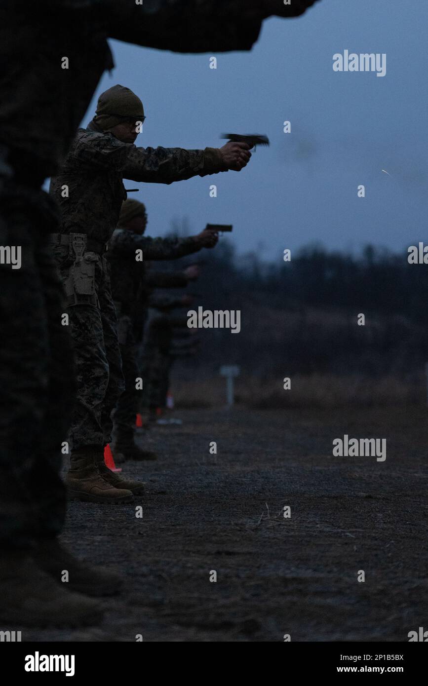 U.S. Marine Corps Lance Cpl. Cole Moore, center, a Clayton, North ...