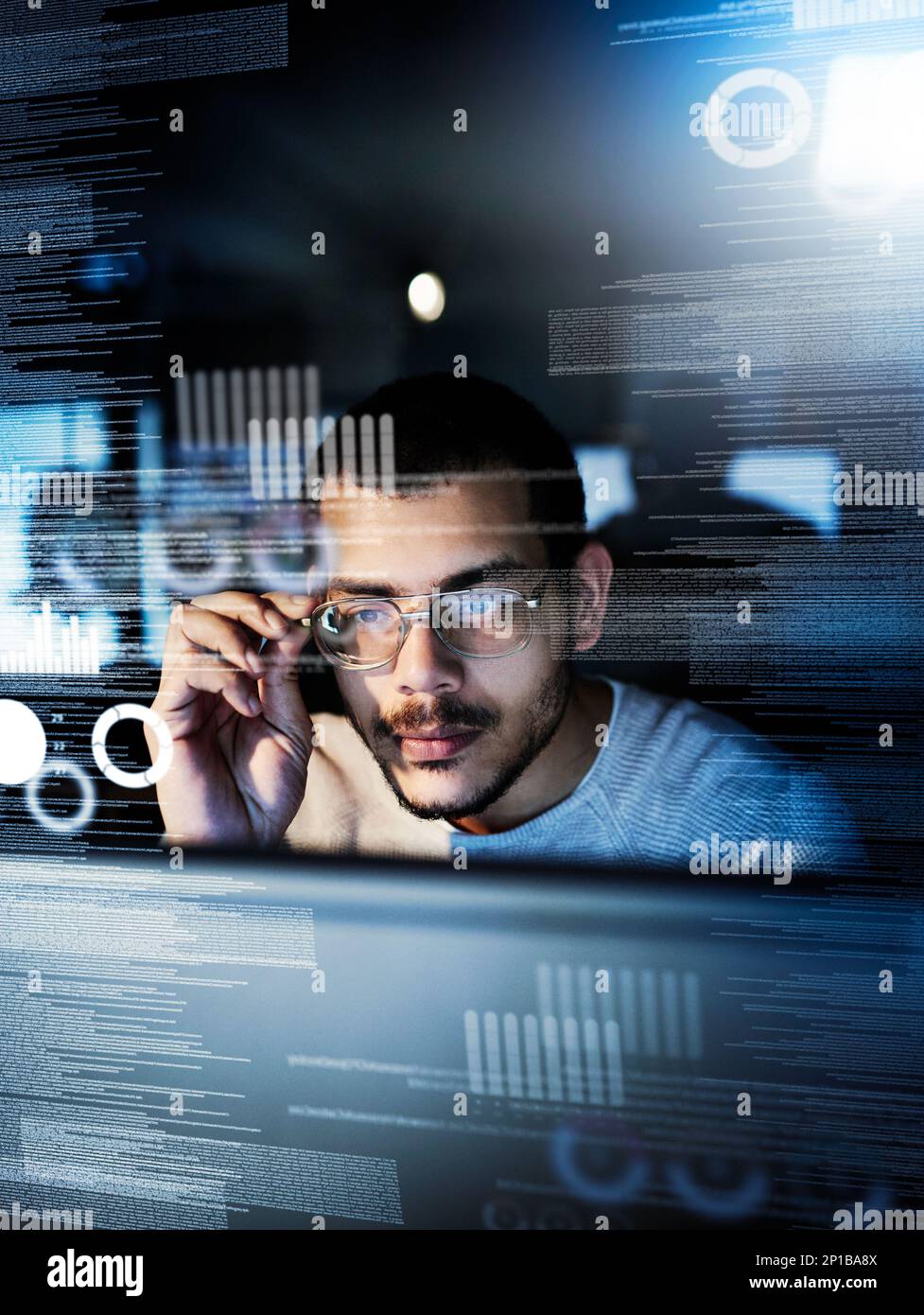 Testing his code. Cropped shot of a male computer programmer working on new code. Stock Photo
