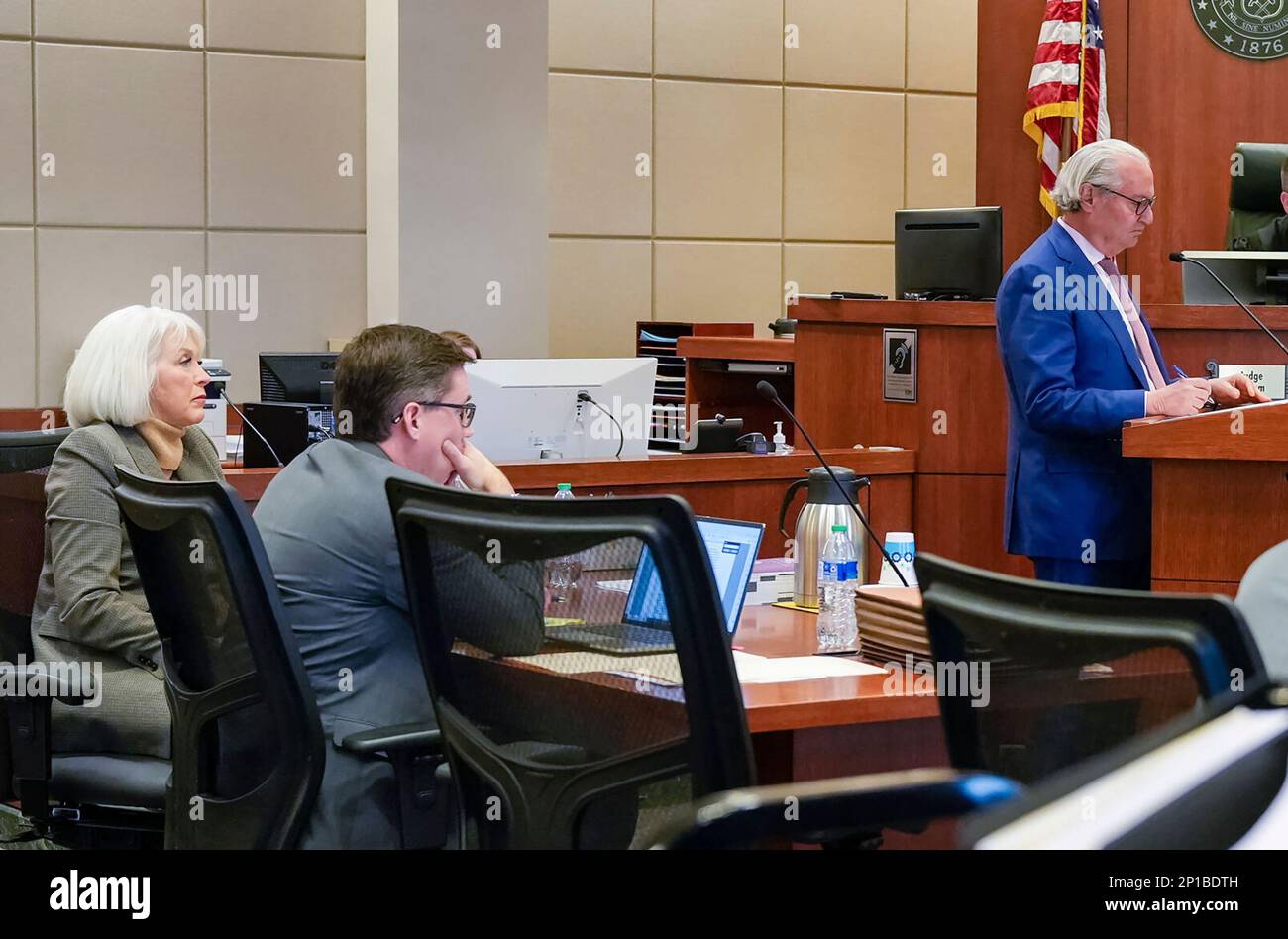 Harvey Steinberg, right, listens during a trial for forner Mesa County