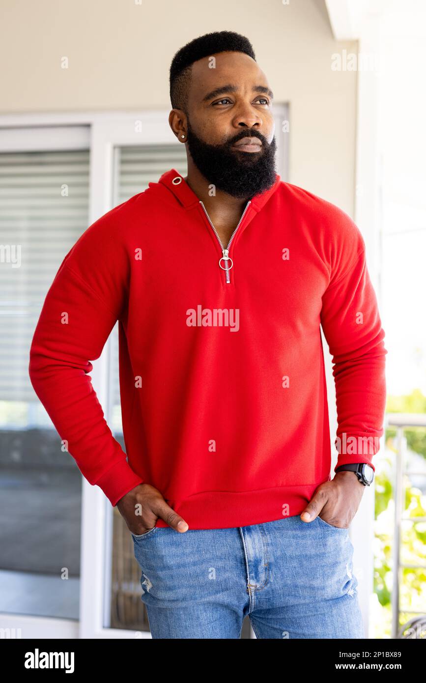African american man wearing red sweatshirt with copy space Stock Photo