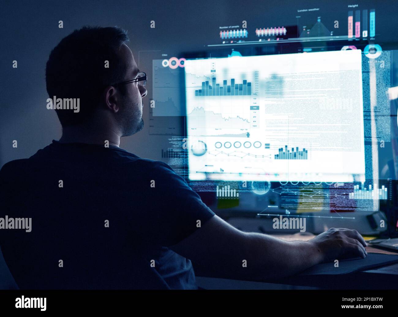 Programming new software. Cropped shot of a young computer programmer looking through data. Stock Photo