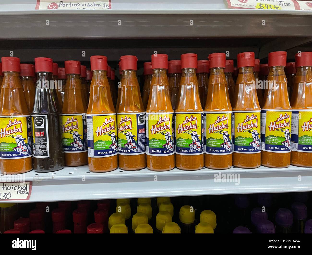https://c8.alamy.com/comp/2P1D45A/bottled-sauces-for-sale-on-shelves-at-the-municipal-market-in-the-shopping-quarter-of-hermosillo-mexico-2P1D45A.jpg