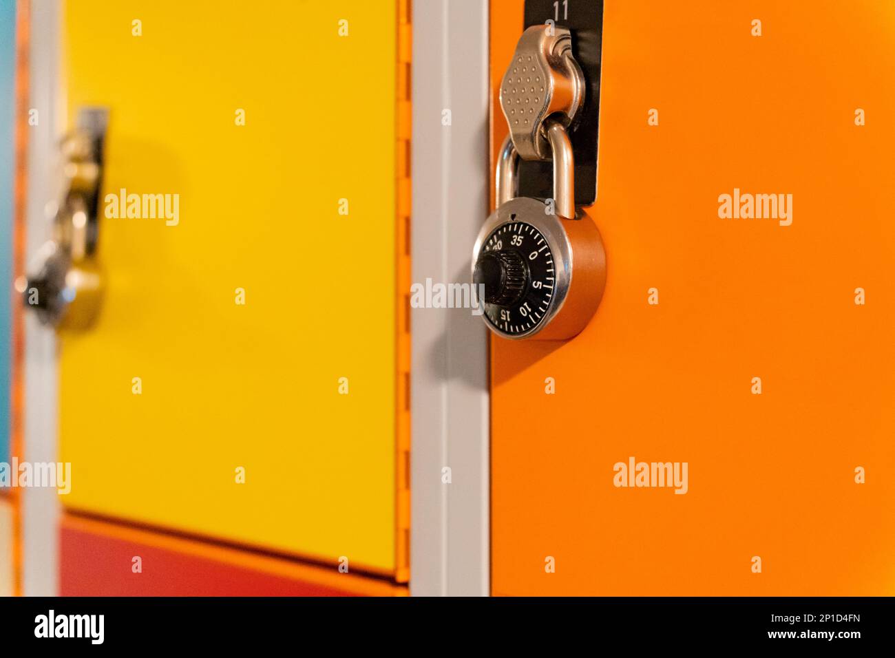 Combination locks on colorful school lockers Stock Photo