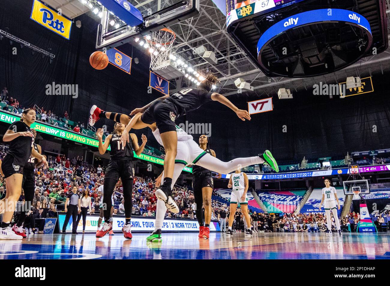 March 3, 2023 NC State Wolfpack guard Aziaha James (10) fouls Notre